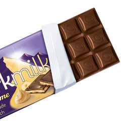 Milka Black Milk – Ciocolată alpină neagră cu lapte și umplutură cremoasă de nuga – 85g