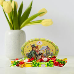 Cutie cadou Heidel cu felicitări de Paște 183g, praline premium din ciocolată cu lapte cu cutie metalică decorativă, ideală ca și cadou de Paște