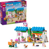 LEGO Friends Hundekuchenbäckerei - Kinder Einkaufsladen mit 2 Mini Puppen, 4 Tierfiguren, Tiertragetasche und Spielzeug Futterzubehör - Geburtstagsgeschenk für Mädchen ab 6 Jahren - 42677