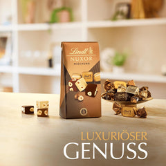 Lindt Ciocolată | Mix pentru pungă NUXOR | 103g | Cuburi cremoase de ciocolată Gianduja în trei sortimente cu alune întregi prăjite | Cadou de ciocolată