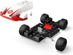 LEGO City F1 Williams Racing și Haas F1 Racing Cars - Jucărie Formula 1 cu mașini construibile și 2 minifigurine cu șofer de curse - Idei de cadouri mici pentru băieți și fete de la 4 ani 60464 Seturi de constructie Besuche den LEGO-Store