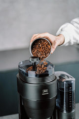 Melitta AromaFresh X – Espressor cu filtru, cu râșniță integrată, carafă de sticlă și funcție de temporizator, pentru până la 10 cești de cafea, negru/argintiu
