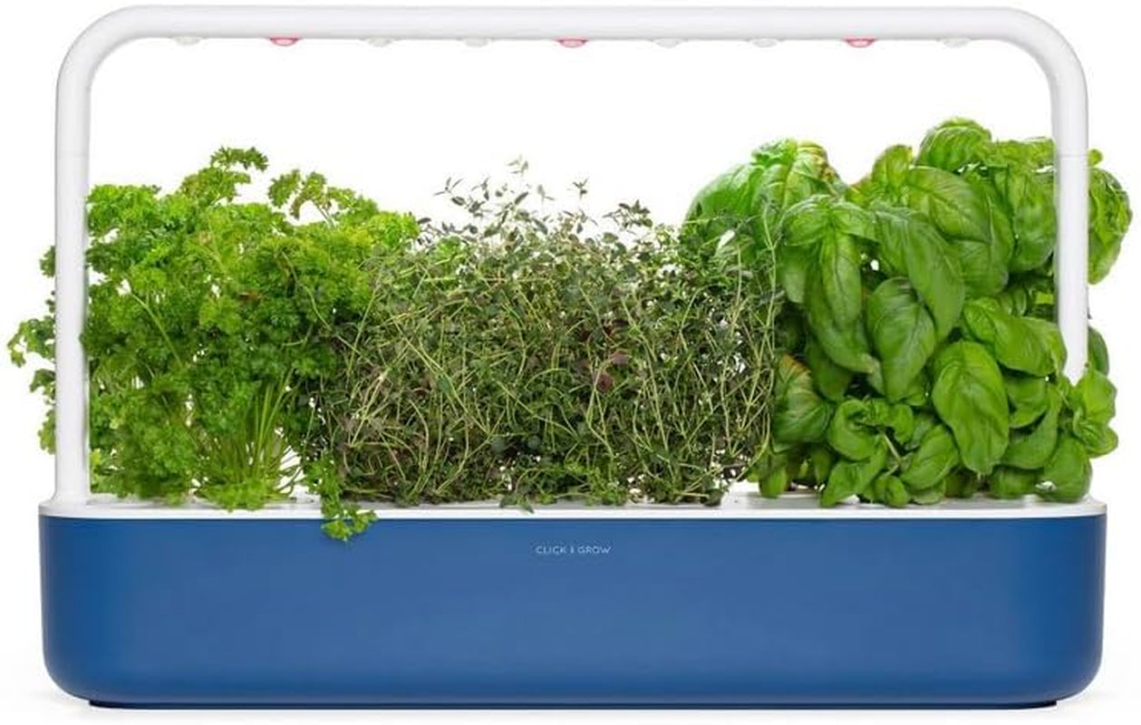 Grădină interioară Click and Grow, mai ușoară decât un sistem de creștere hidroponic, Grădină inteligentă cu LED, grădină de plante aromatice, seră interioară cu 9 capsule de plante incluse (alb)