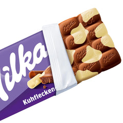 Milka Cow Spots – Ciocolată cu lapte alpină cu ciocolată albă în design cu pete de vacă – 24 x 90g