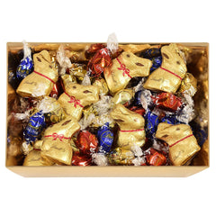Cuib de Paște Colorat cu Ciocolată Lindt | 310 g | 8 x Mini Iepurași Aurii, 26 x Ouă de Ciocolată cu Lapte Lindor, 15 x Ouă de Ciocolată Albă Lindor, 10 x Ouă de Ciocolată Neagră Lindor | Ciocolată de Paște | Cadou de Ciocolată