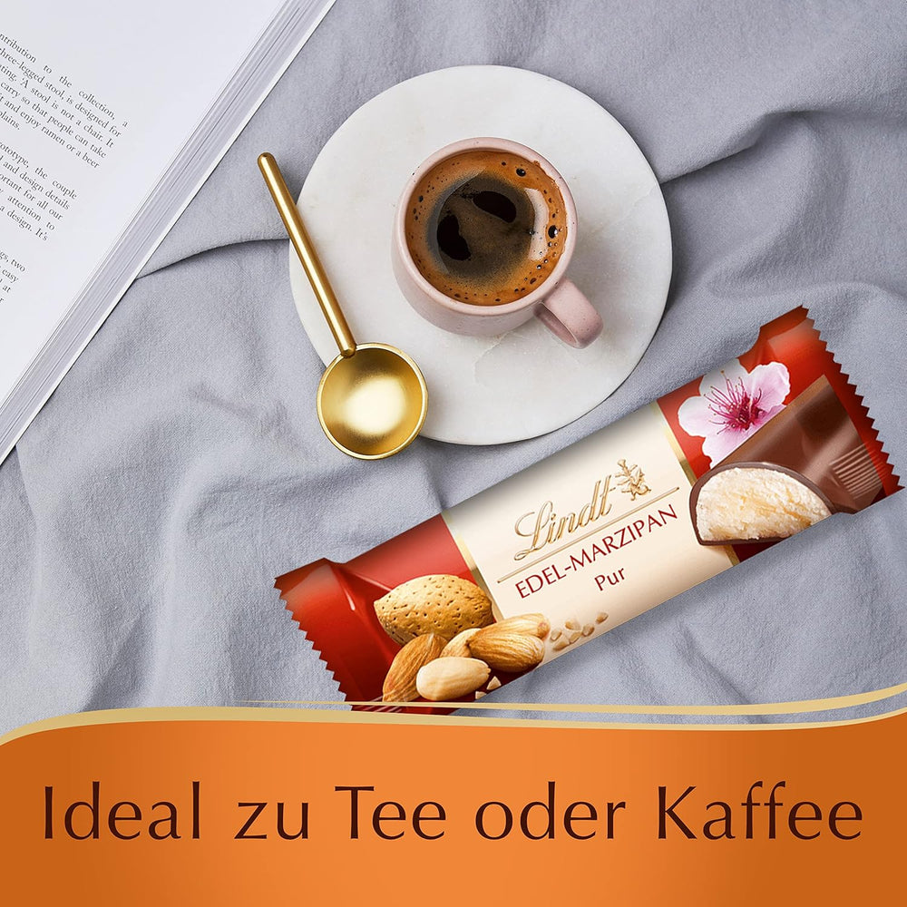 Prezentare de blat Lindor cu ciocolată | 1718 g și batoane de ciocolată cu marțipan | 25 batoane x 50 g într-un prezentare de blat | 1250 g | Marțipan pur acoperit cu ciocolată neagră | Batoane de ciocolată