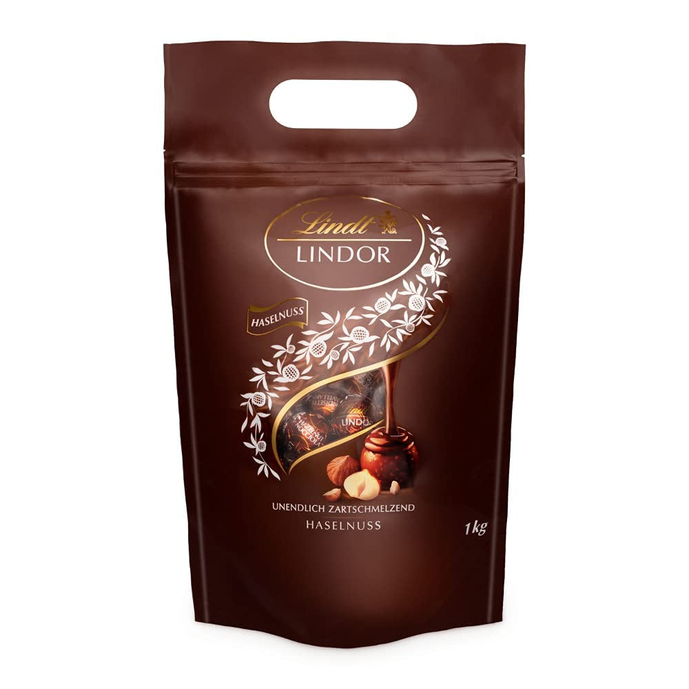 Bile de ciocolată LINDOR cu alune, pungă de 1 kg + butoi Johnnie Walker Sherry 0,7 litri
