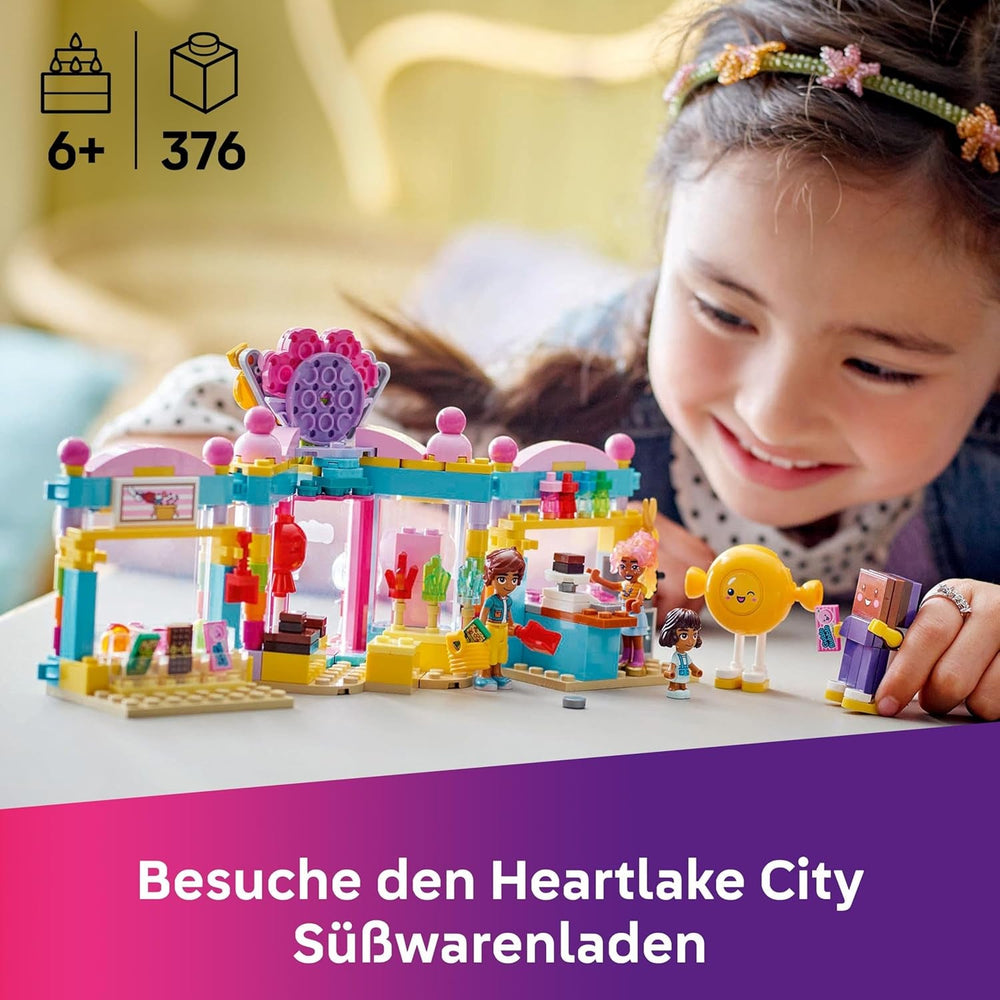 LEGO Friends Heartlake City Süßwarenladen - Kinder Spielset zum Bauen mit 3 Minifiguren, Einer Katzenfigur, Spielzeug Lebensmittel und Zubehör - Geschenk für Mädchen und Jungen ab 6 Jahren - 42649