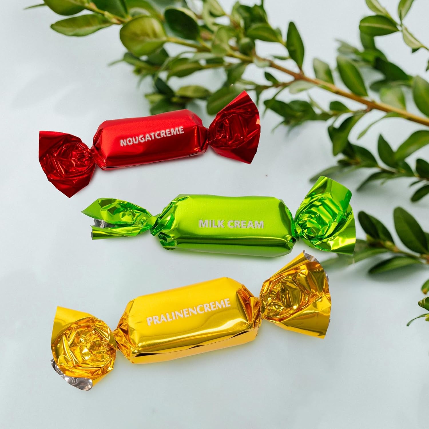 Cutie cadou Heidel cu felicitări de Paște 183g, praline premium din ciocolată cu lapte cu cutie metalică decorativă, ideală ca și cadou de Paște