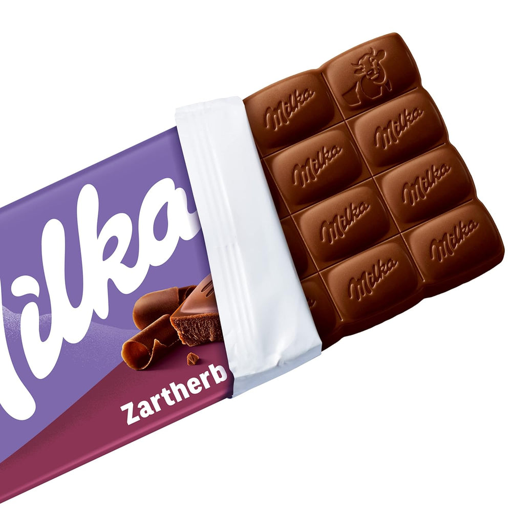 Milka Zartherb – ciocolată alpină neagră cu lapte, cu o notă delicată de cacao, într-un pachet multiplu – 25 x 90g