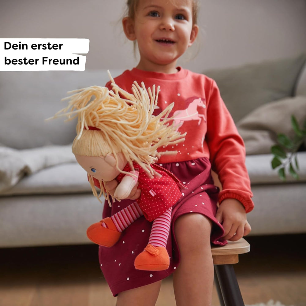 HABA Stoffpuppe Annelie – Weiche Puppe mit Haaren zum Stylen – Mit wechselbarer Kleidung – Ab 18 Monaten – 30 cm – Waschbar – 1302108001