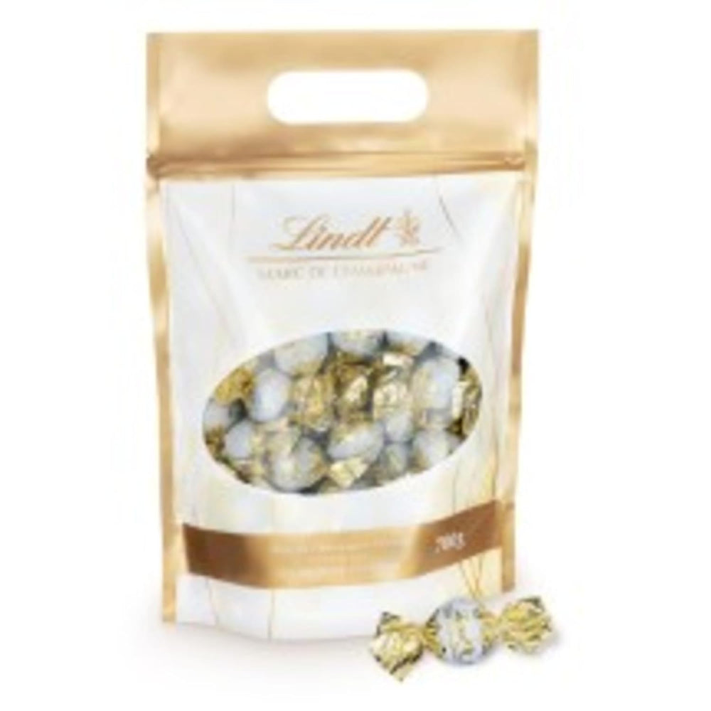Bile de ciocolată Lindt Marc de Champagne | 700 g | Aprox. 56 de bomboane de ciocolată cu lapte cu umplutură rafinată, conține alcool | Pachet vrac | Cadou de ciocolată | Cadou de ciocolată