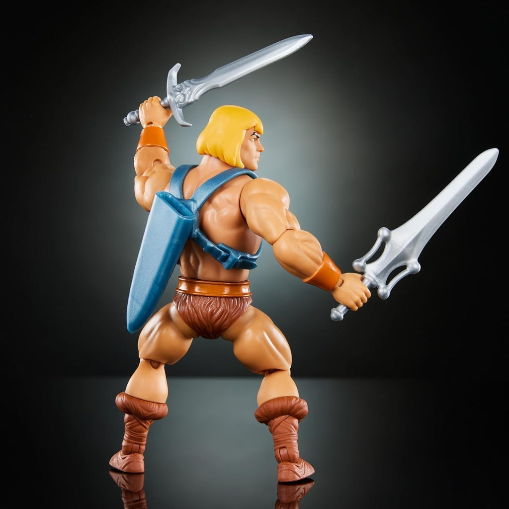Jucărie Masters of the Universe Origins, He-Man figurină de acțiune din colecția de desene animate, la scară reală, aprox. 14 cm înălțime, erou cu armură, 2 săbii și mini benzi desenate, HYD17 Action figures Naty Shop
