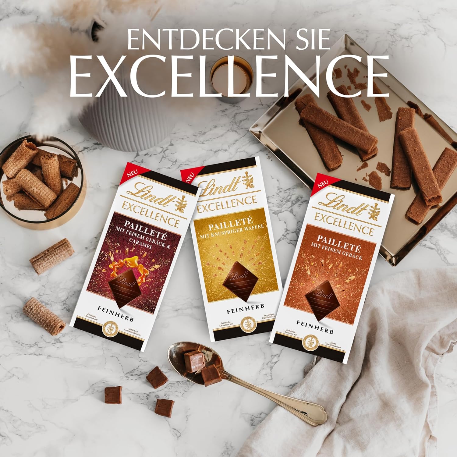 Lindt EXCELLENCE Bucăți De Aluat Cu Paiete Și Caramel - Ciocolată Neagră Fină Cu Aromă Intensă De Cacao