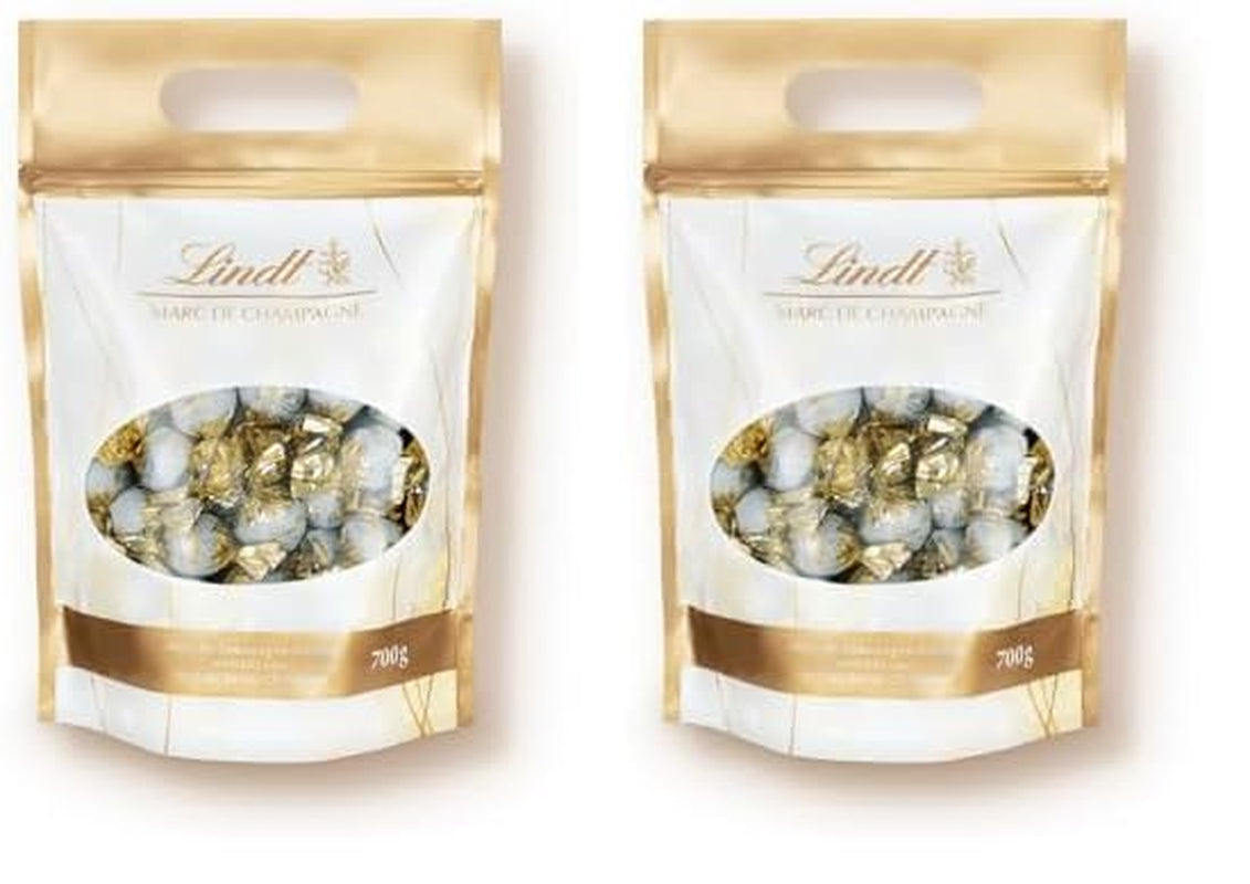 Bile de ciocolată Lindt Marc de Champagne | 700 g | Aprox. 56 de bomboane de ciocolată cu lapte cu umplutură rafinată, conține alcool | Pachet vrac | Cadou de ciocolată | Cadou de ciocolată