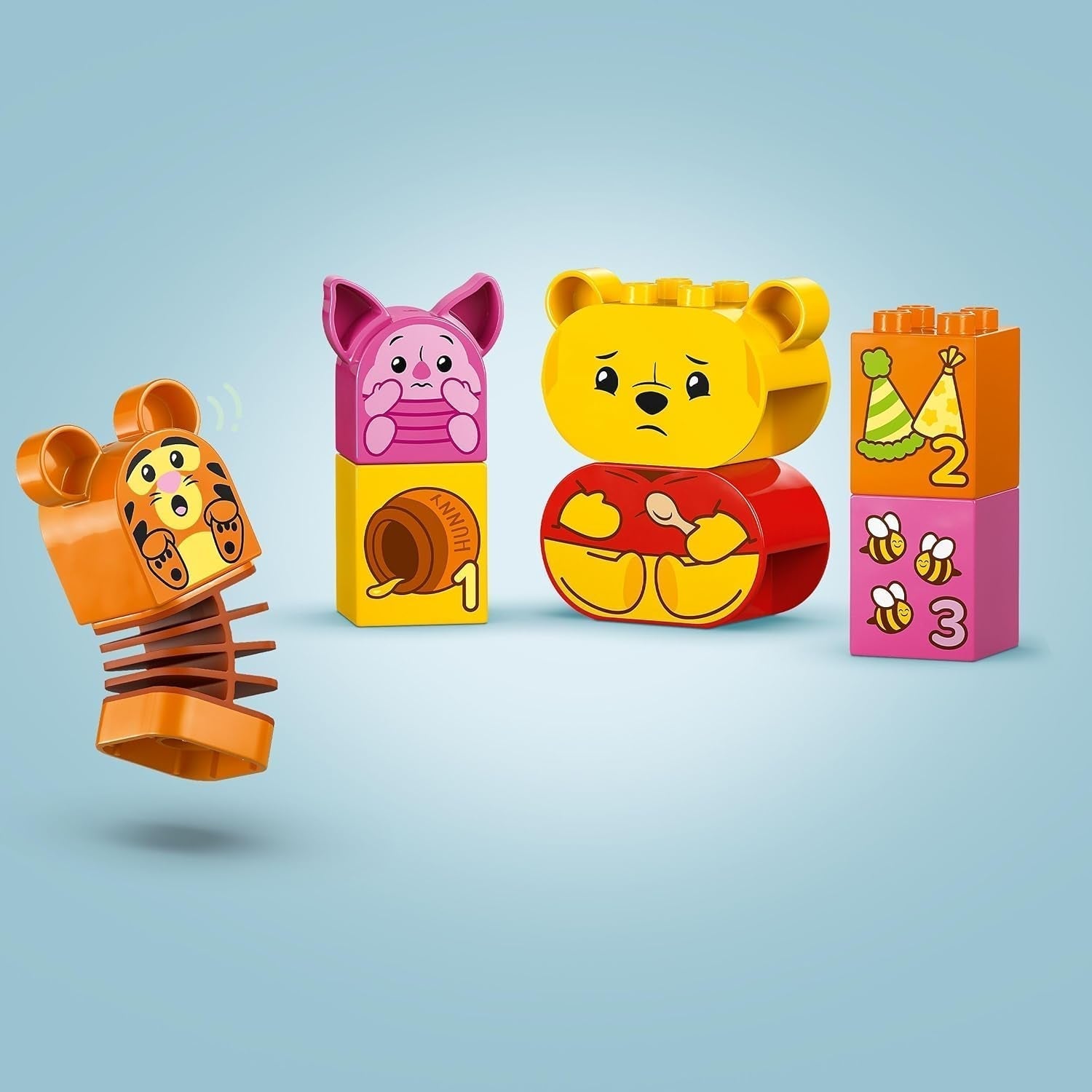 LEGO DUPLO - Disney Winnie the Pooh's Birthday Party - jucărie educativă pentru preșcolari - set cu 3 minifigurine, inclusiv Winnie the Pooh, Tigger și Piglet - idee de cadou pentru băieți și fete de la 1,5 ani 10457 Seturi de constructie Besuche den LEGO-Store