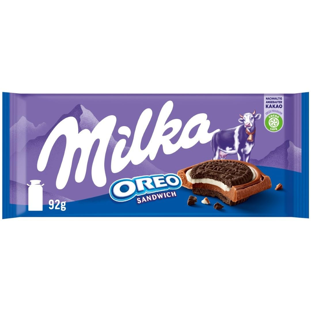 Sandwich Milka Oreo – Ciocolată cu lapte alpină, umplută cu bucățele crocante de biscuiți Oreo și cremă fină de vanilie – 92g