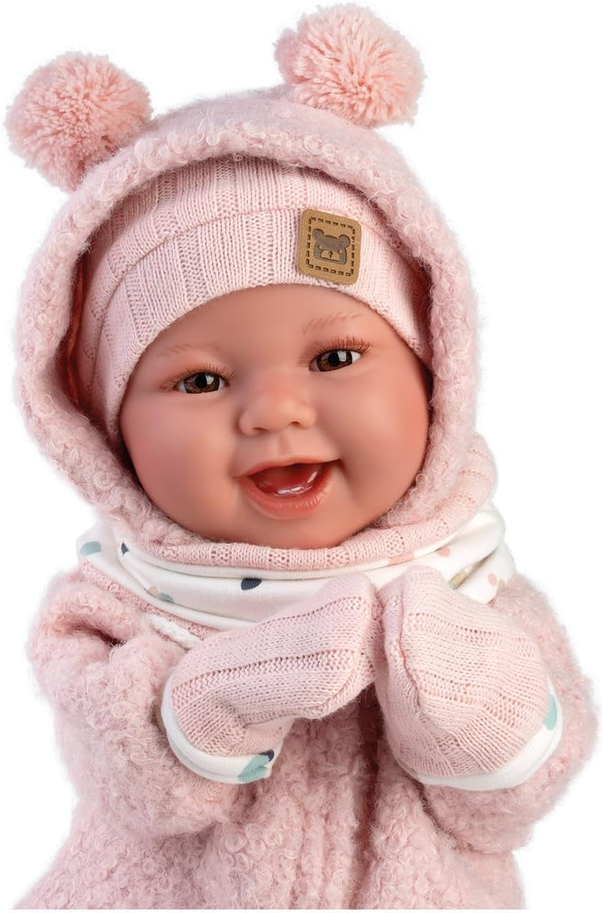 Llorens 1018480 Babypuppe Tala, mit braunen Augen und weichem Körper, Baby Puppe inkl. flauschigem rosa Winter-Outfit, Schnuller, Schnullerkette, 44 cm