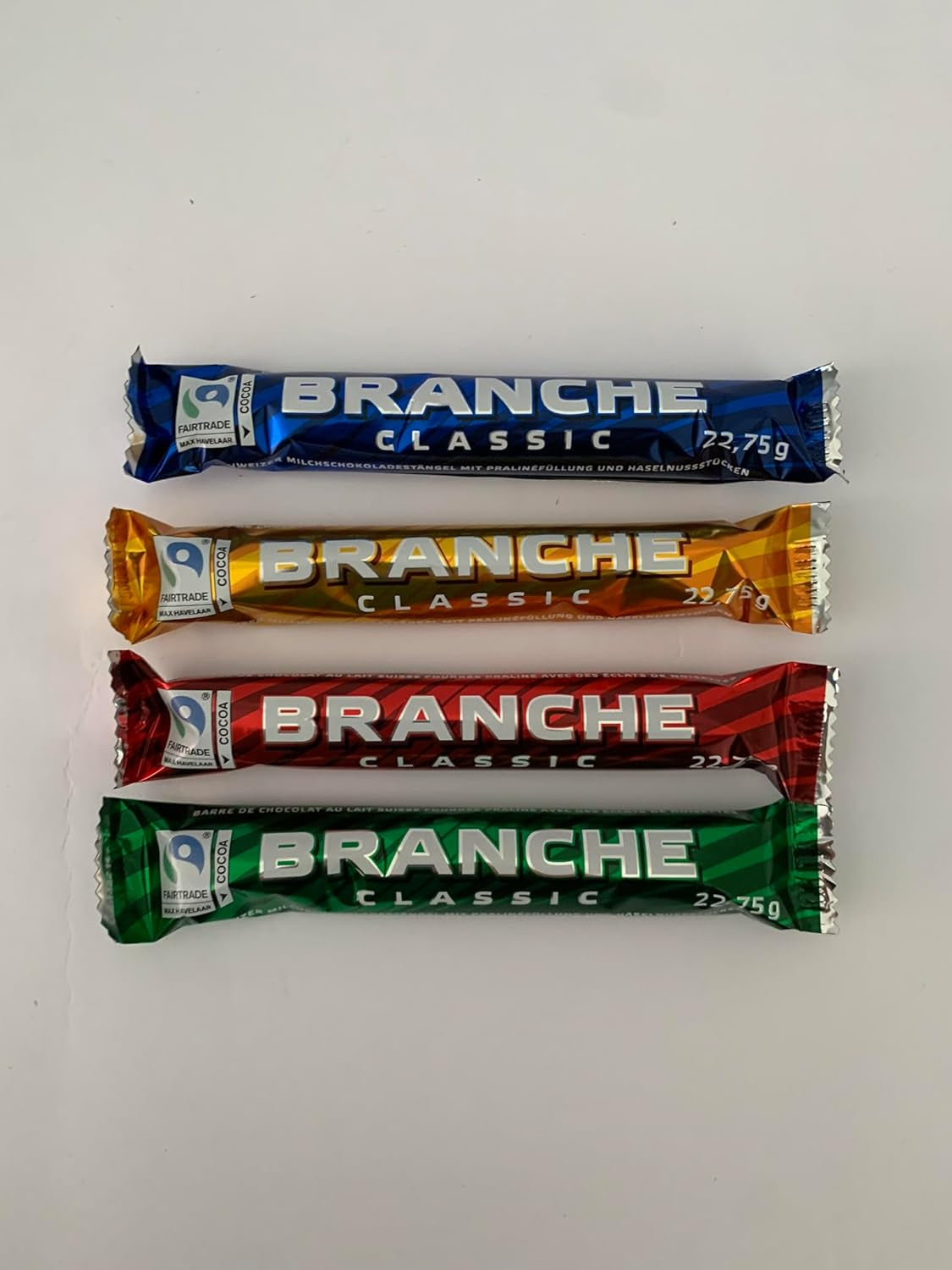 Batoane de ciocolată cu lapte Branches, pachet de 50 - Batoane de ciocolată cu lapte cu umplutură de cremă de alune - Ciocolată elvețiană - Pachet vrac de 50 de batoane ambalate individual (23g fiecare) / 1150g